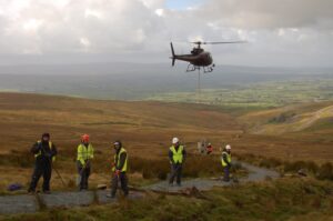 Stone was airlifted to the work site by helicopter. Pic Hanson Aggregates Stone was airlifted to the work site by helicopter. Pic Hanson Aggregates